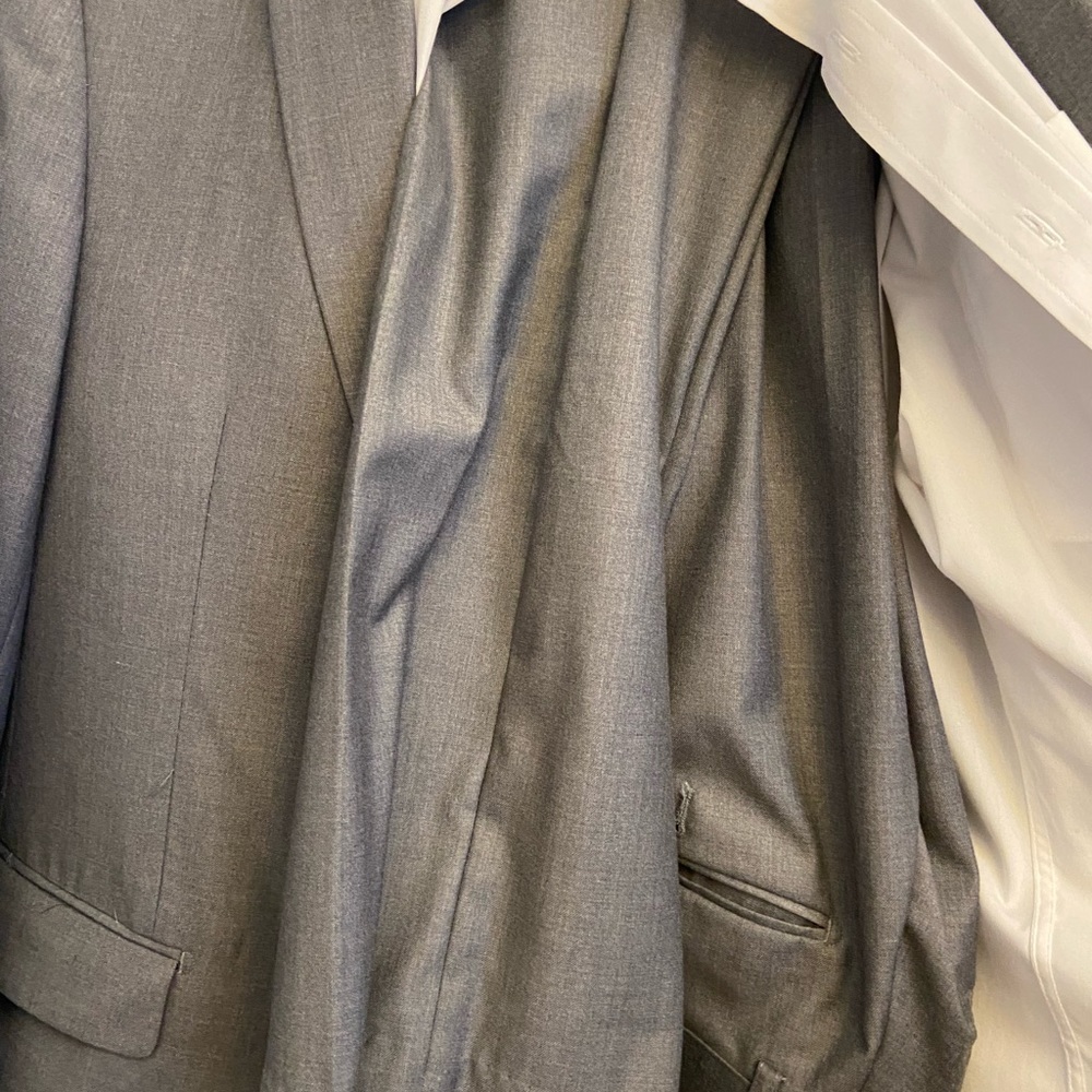 Only worn once. White button up included. Comes with pants size 38/32.